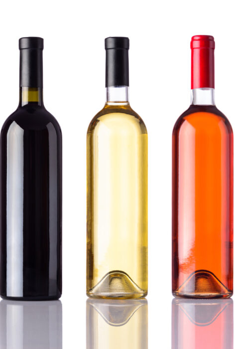 Bottles of Wine Isolated on White Background Different Bottles of wine isolated on white background. White, Rose and Red Wine.